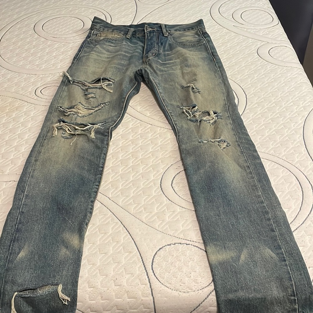 Distressed Denim Jeans
